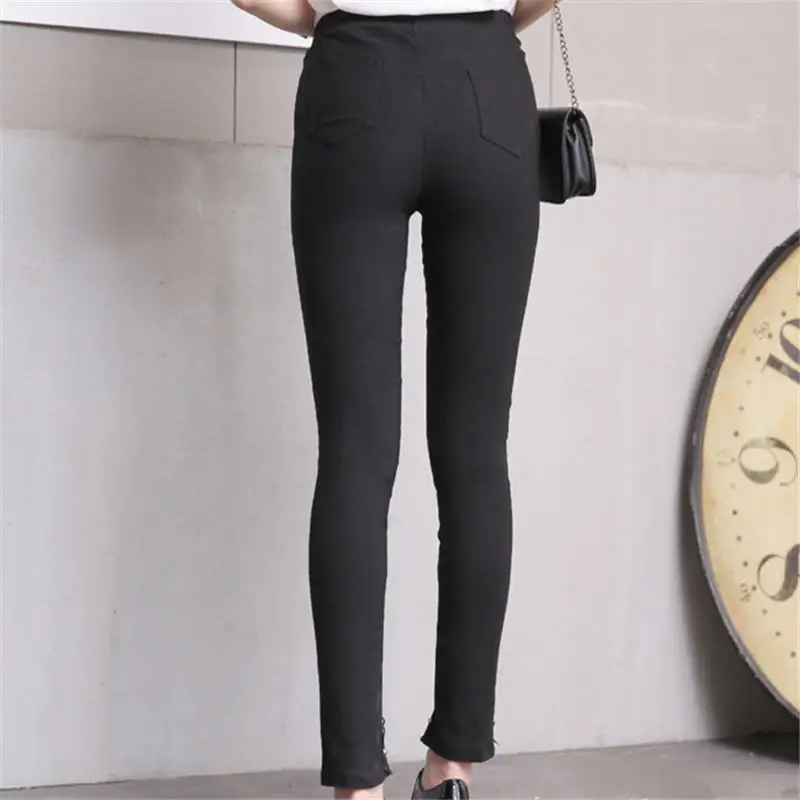 Модные леггинсы середины талии Мотобрюки вискоза Кружево заклепки Разделение