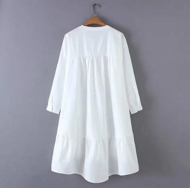 Женское свободное платье-трапеция с асимметричным подолом однотонное