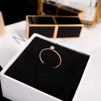 yun ruo 2018 fashion winding zircon inlay rings rose gold color fashion titanium steel jewelry birthday gift woman dropship 2019