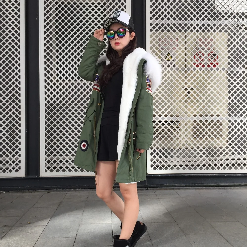 Рисунок 4 - Женская длинная парка с вышивкой