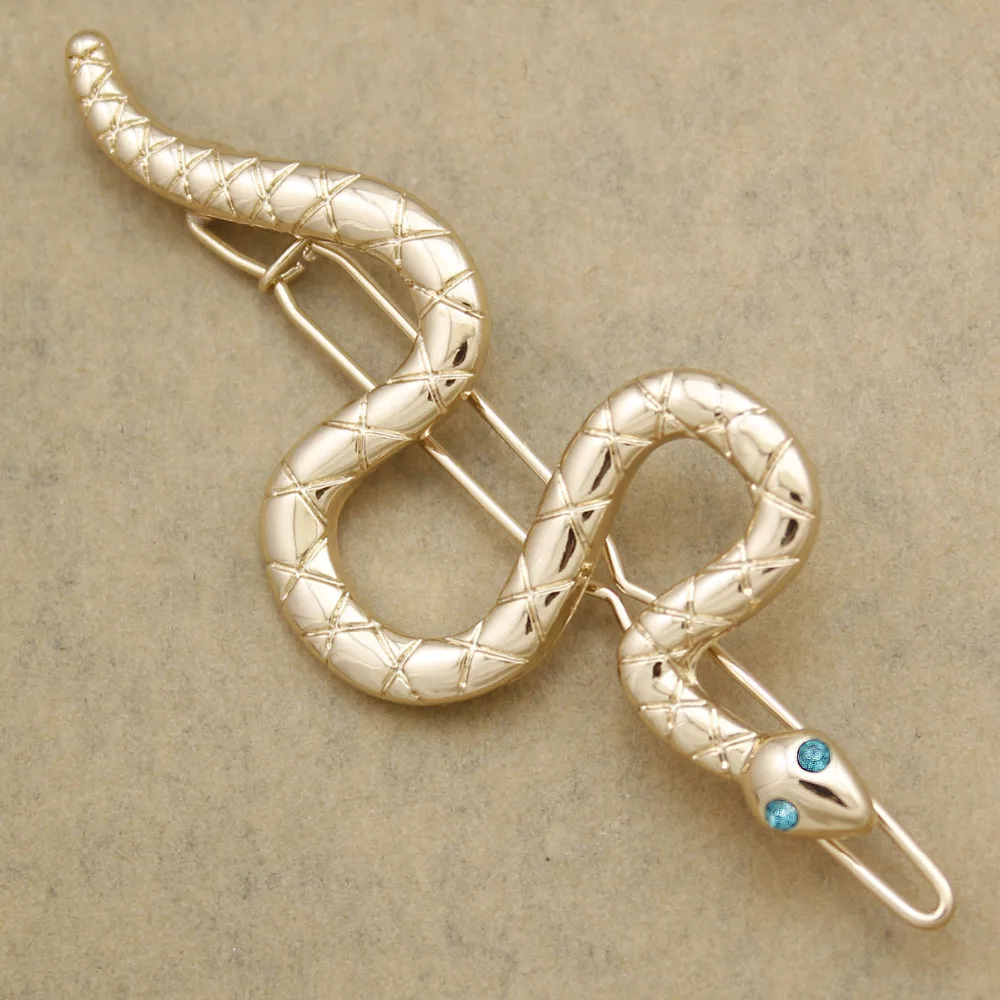 клеопатра и змея. змея клеопатры 5 букв. змейка для волос. ободок змея. браслеты египетских цариц.