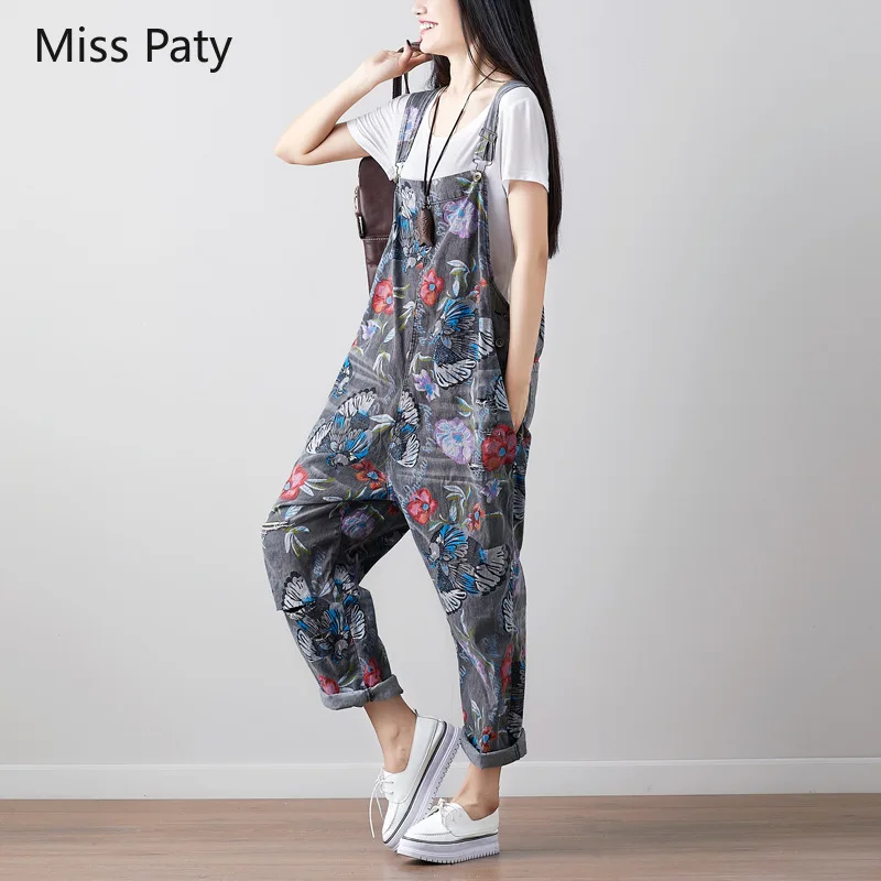 Женский джинсовый комбинезон с широкими штанинами рваный большого размера