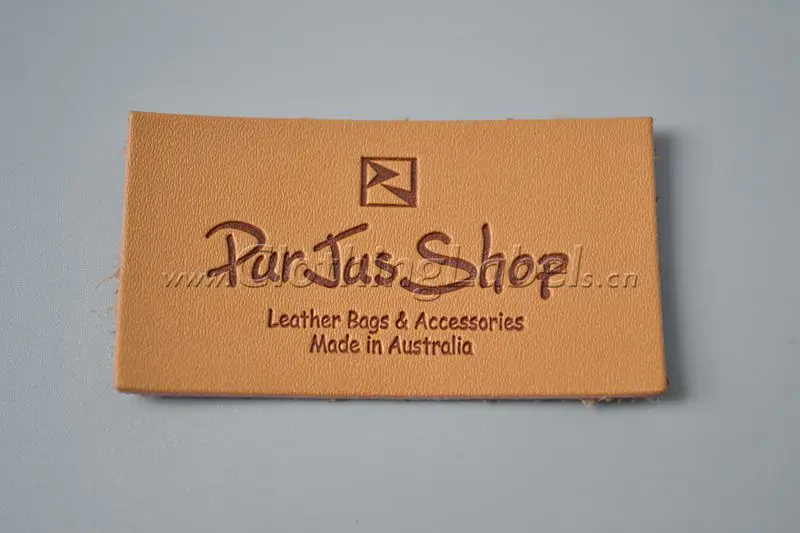 Пользовательская кожаная этикетка для джинсовой ткани тисненый логотип высечка