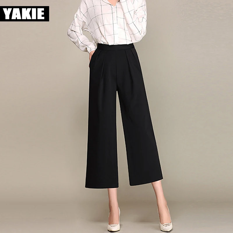 Брюки женские черные белые широкие с высокой эластичной талией в стиле пэчворк