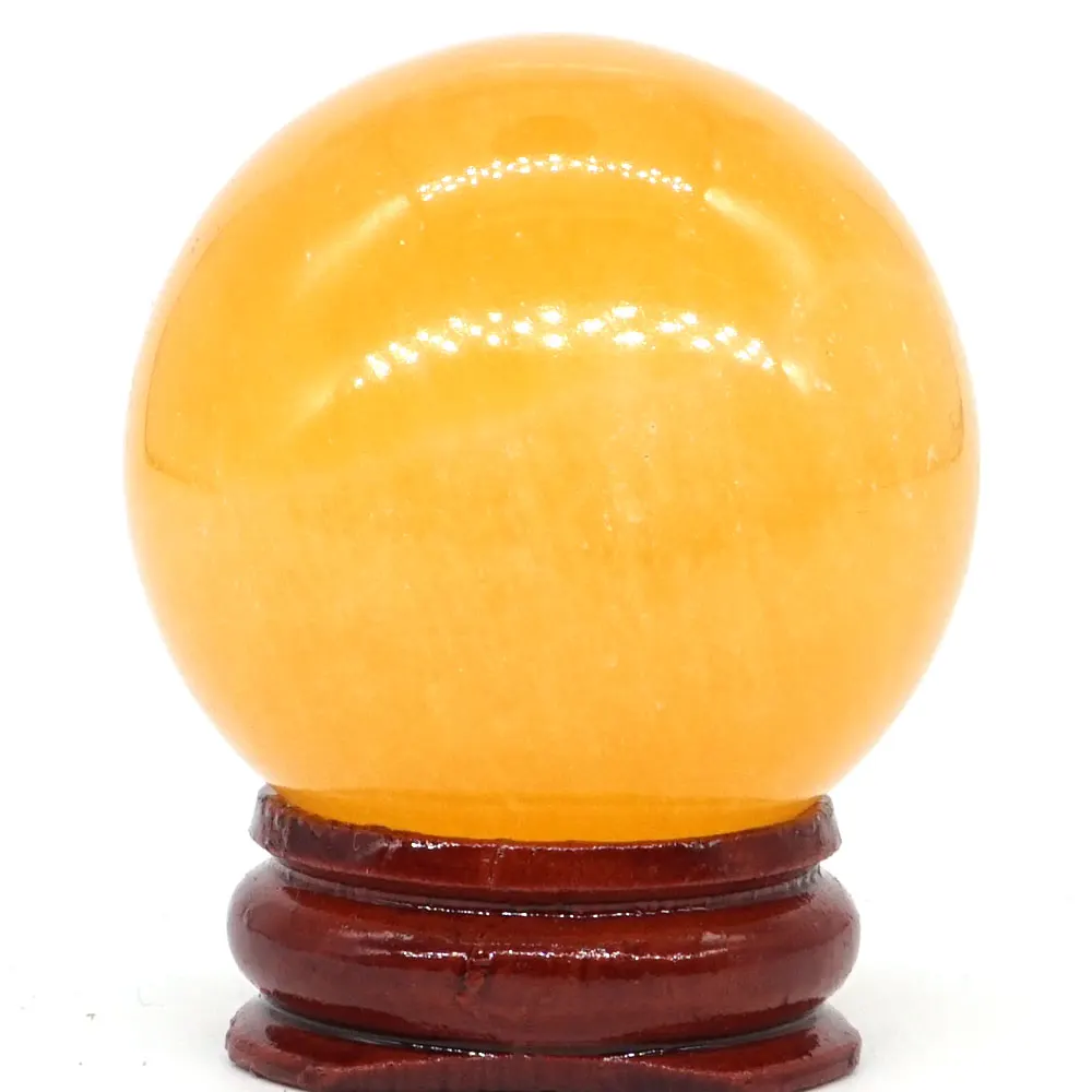Шар из натурального оранжевого гипса селенита атласный спиральный шар