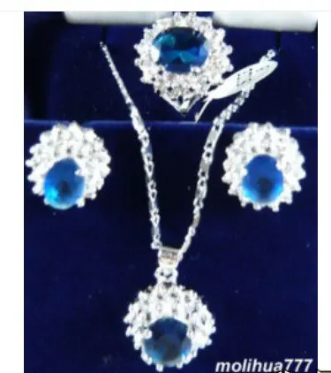 

Silver Crystal Pendant Necklace Earrings Ring set