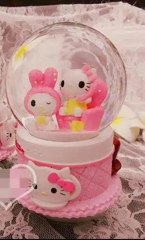 kt cat snow crystal ball rotating music box | Stones