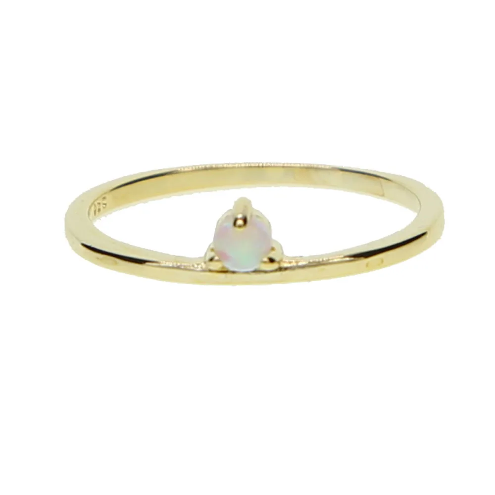 Женское кольцо с опалом золотого цвета простое изысканное белым огненным для