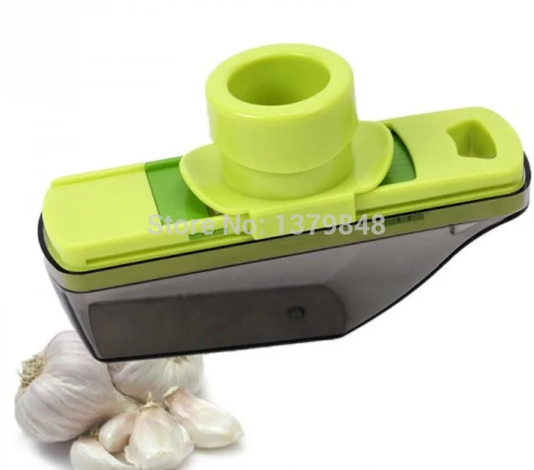 

Multi Function Garlic Press Compact Grater