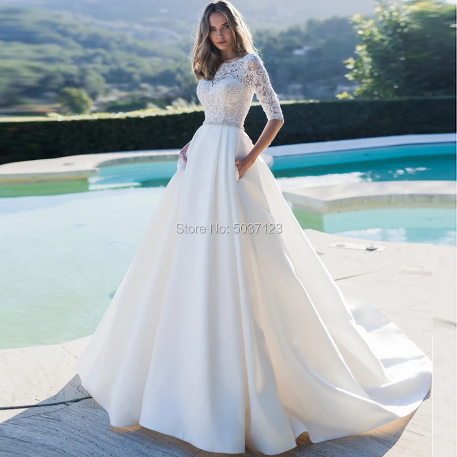

Comfortable A Line Wedding Dresses Lace Appliques Long Sleeves Button O-Neck Bridal Gown Court Train Vestido De Noiva Pockets