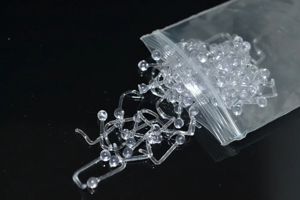 

Free shippment LOT100pcs NOSE RETAINERS HIDE PIERCING CLEAR NOSE RING BONE STUD SCREW
