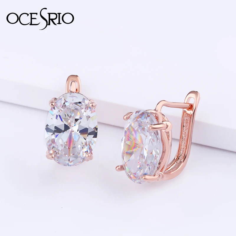 Женские серьги гвоздики OCESRIO из розового золота 585 пробы с овальным цирконием и