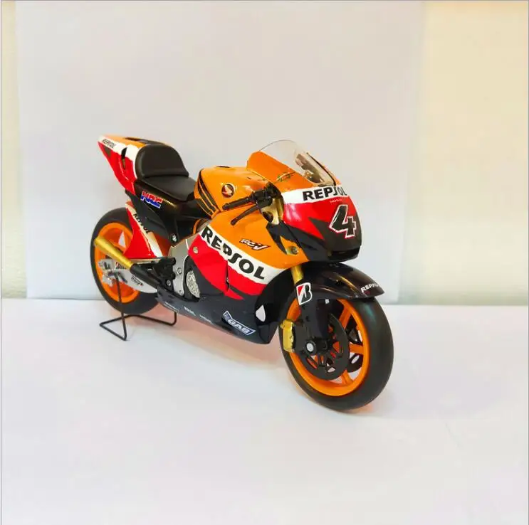 GP трек версия мотоцикла Тяньцзинь модель 4 литая машины RC211V HONDA2006 оранжевый 1/12 |