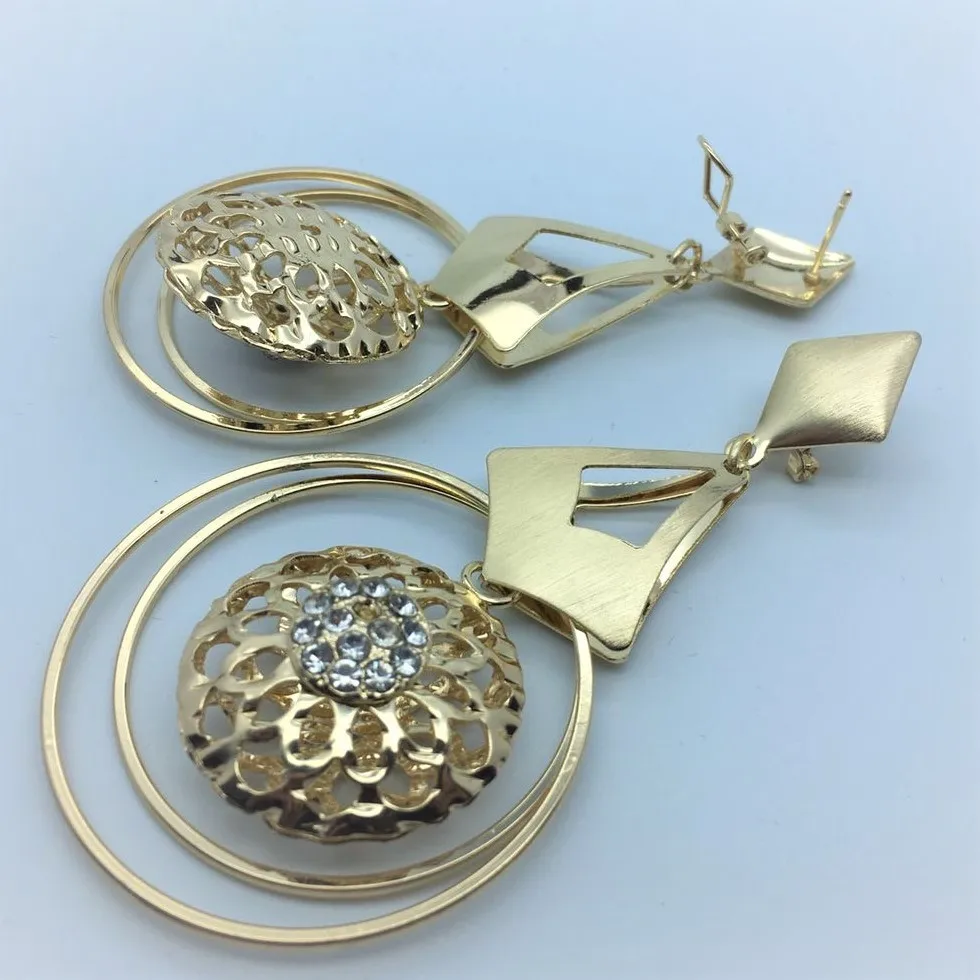 Новинка 2014 серьги подвески золотистого цвета с отверстиями большие длинные в