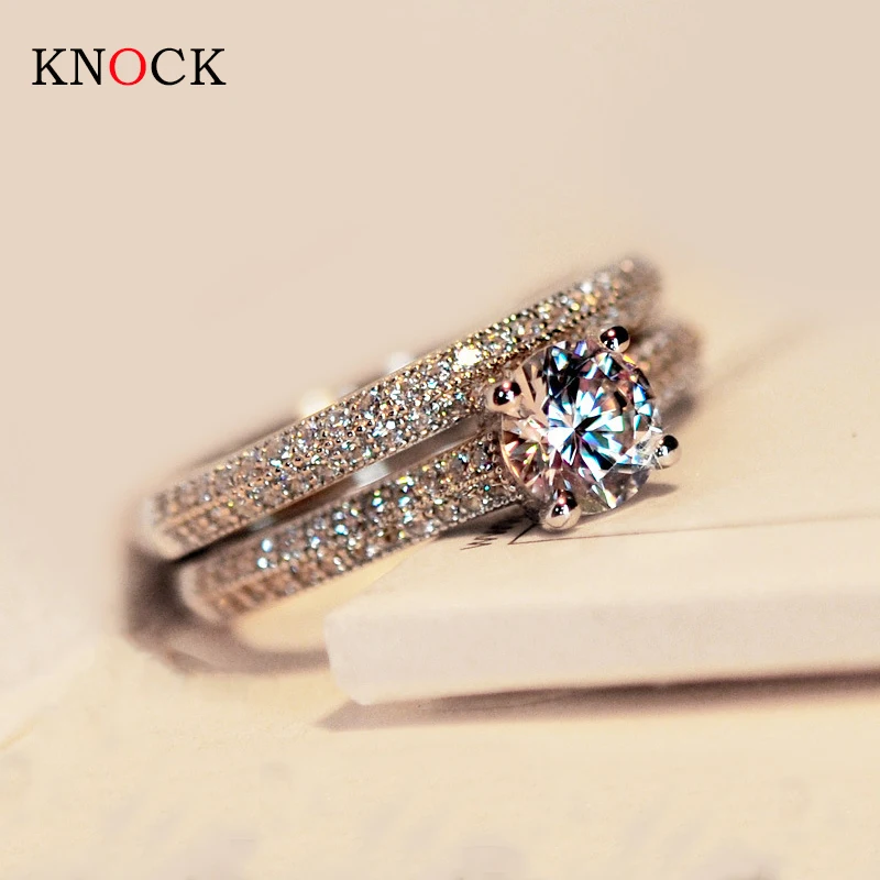 Набор женских обручальных колец с фианитами 2 цвета серебро и розовое золото |