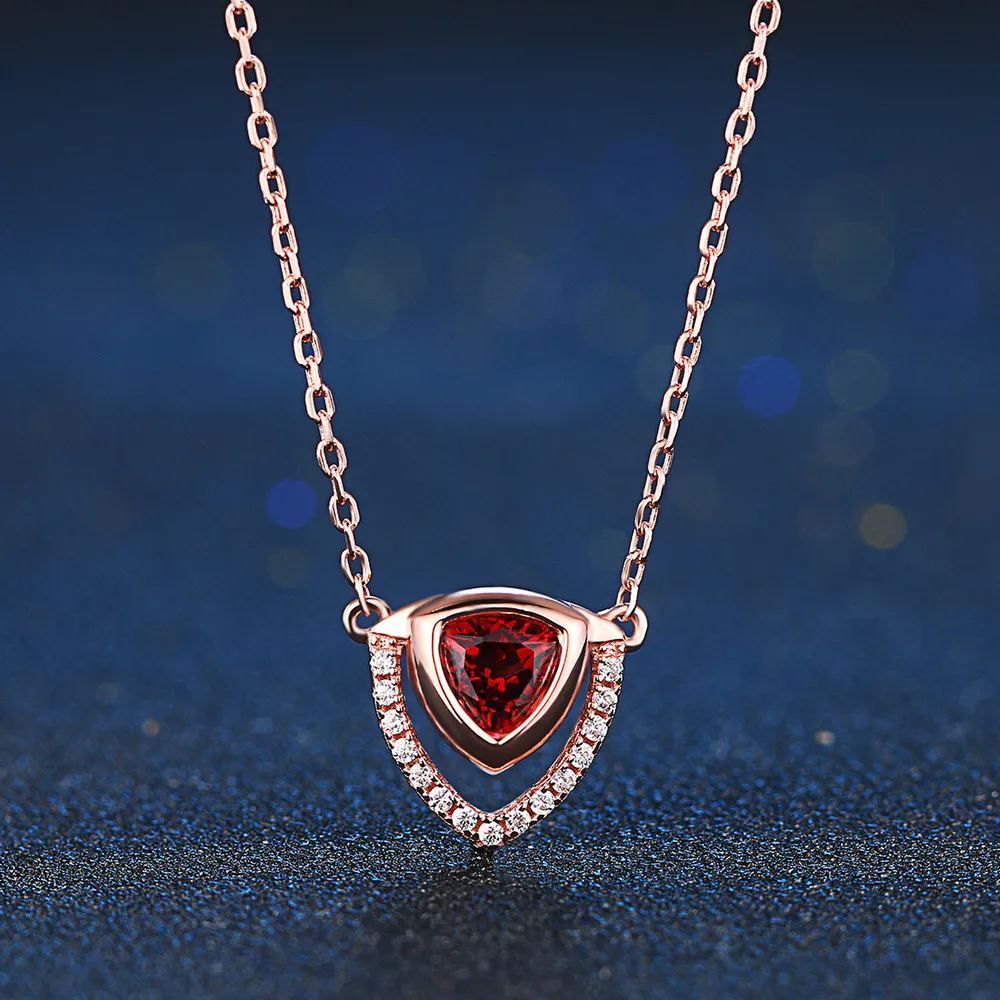 Кулон из серебра 925 пробы с красным гранатом и розовым золотом | Украшения