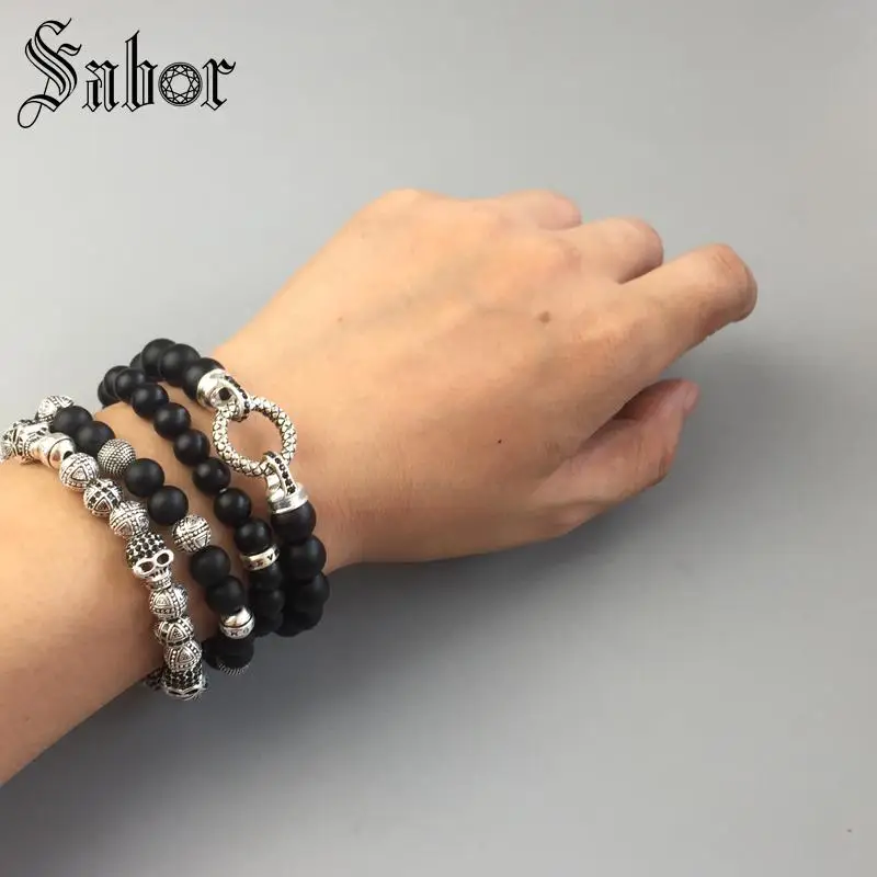 Мужской браслет с черепами и крестиками новинка почерненный серебристый цвет