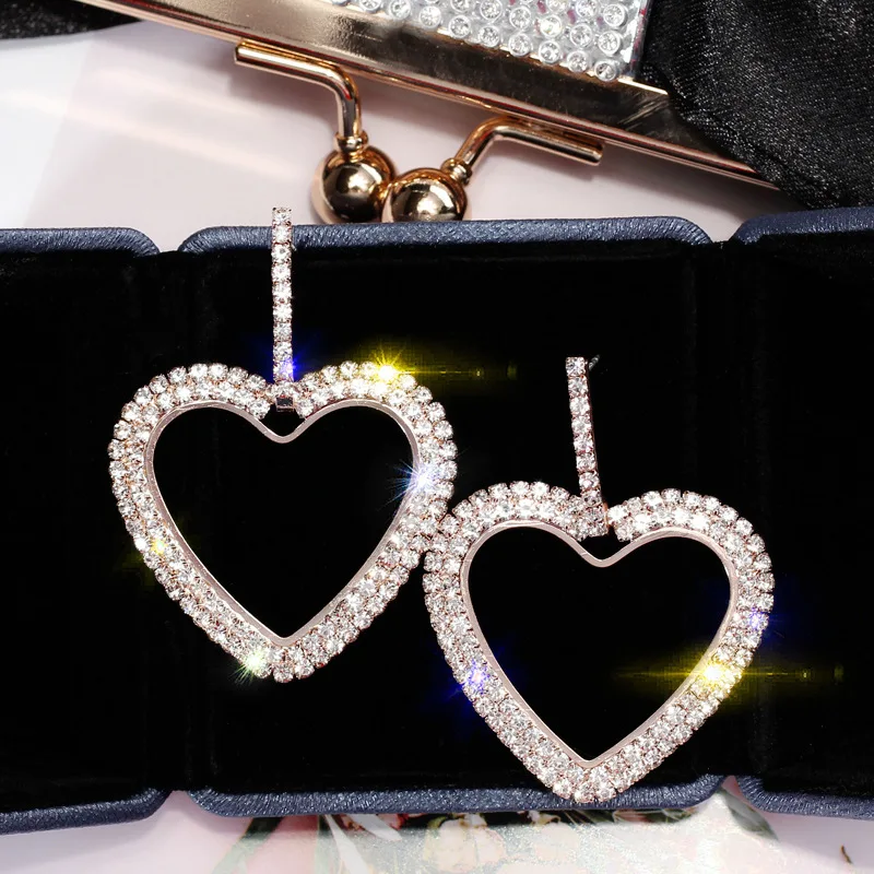 Женские серьги капельки с большим сердечком роскошные из розового золота и