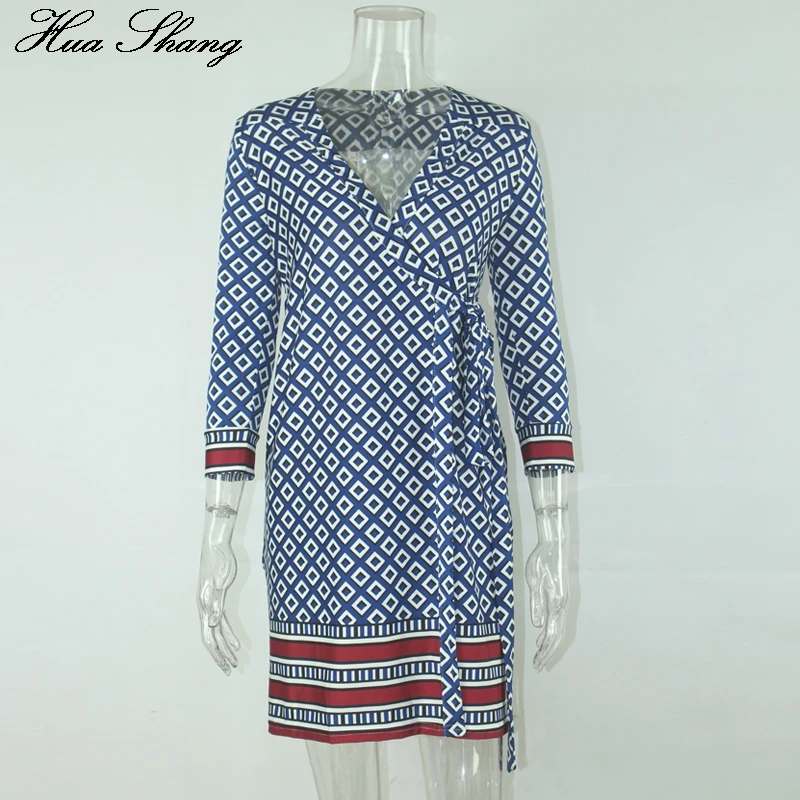 Женское платье средней длины с запахом v-образным вырезом и рукавом три четверти