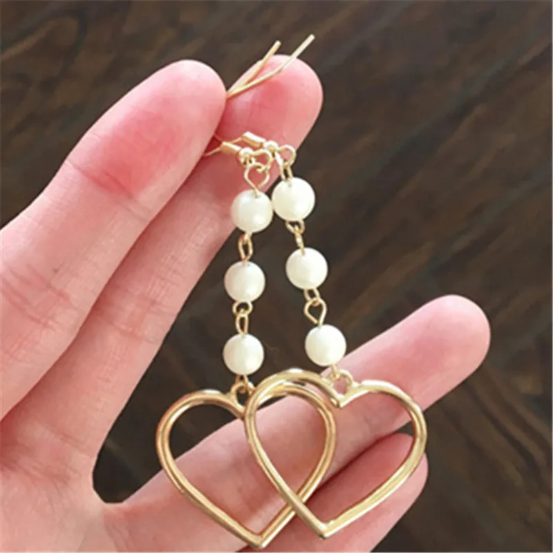 

Fashion woman dangle earrings metal heart pearl Golden earrings for women Popular fine jewelry earrings Accessories wholesale