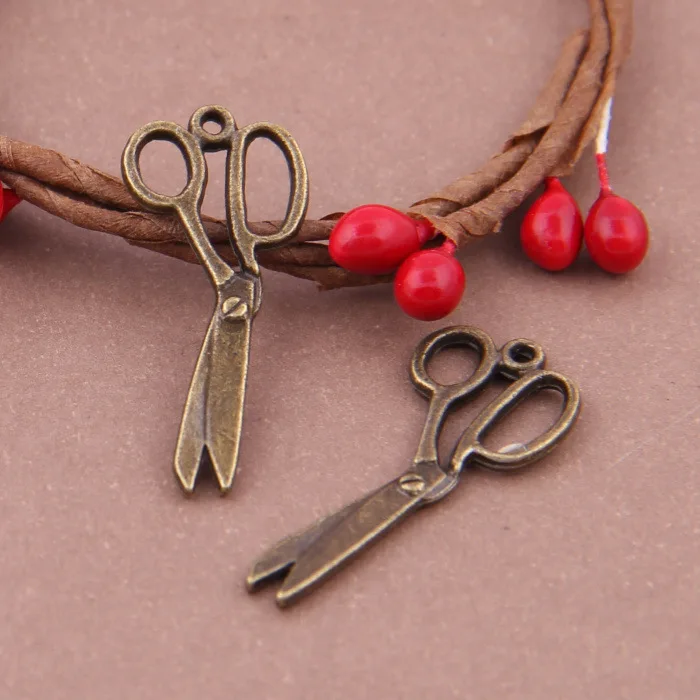 

RAINXTAR Fashion Antique Broze Color Daily Use Scissors Tool Charms DIY Jewelry Findings 12*29mm 100pcs AAC1483