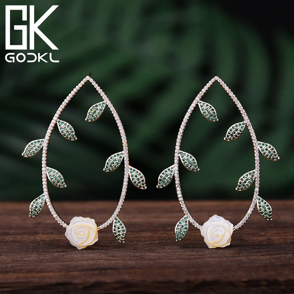 

Женские крупные серьги-гвоздики GODKI, свадебные серьги с фианитом и цветком в форме листа, со стразами, 2018