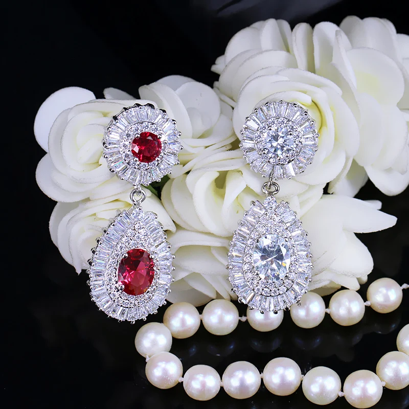 Женские длинные серьги подвески CWWZircons с синими камнями модель CZ314|earrings with blue stone|all