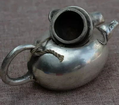 

Exquisite handmade bronzes copper plated Silver Taurus and wine pot.