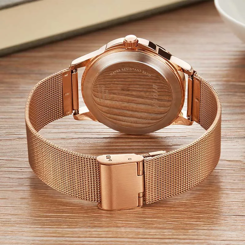 Женские часы розового золота Роскошные водонепроницаемые кварцевые женские с