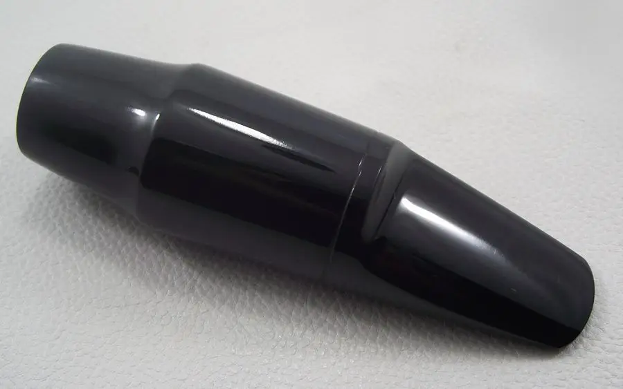 

Alto saxophone mouthpiece Hard rubber good sound