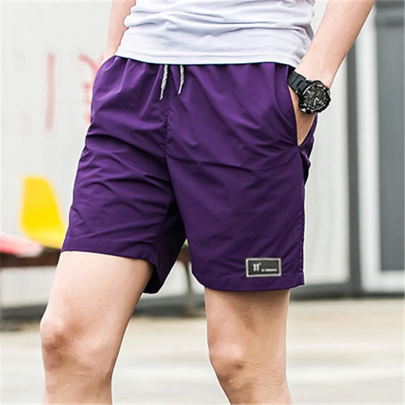 Фиолетовый New Shorts Men Summer Beach board shorts Hot Sale Casual Short Male Solid Quality Elastic Fashion Fast Dry Short S-5XL 1007 - Цвет: Фиолетовый