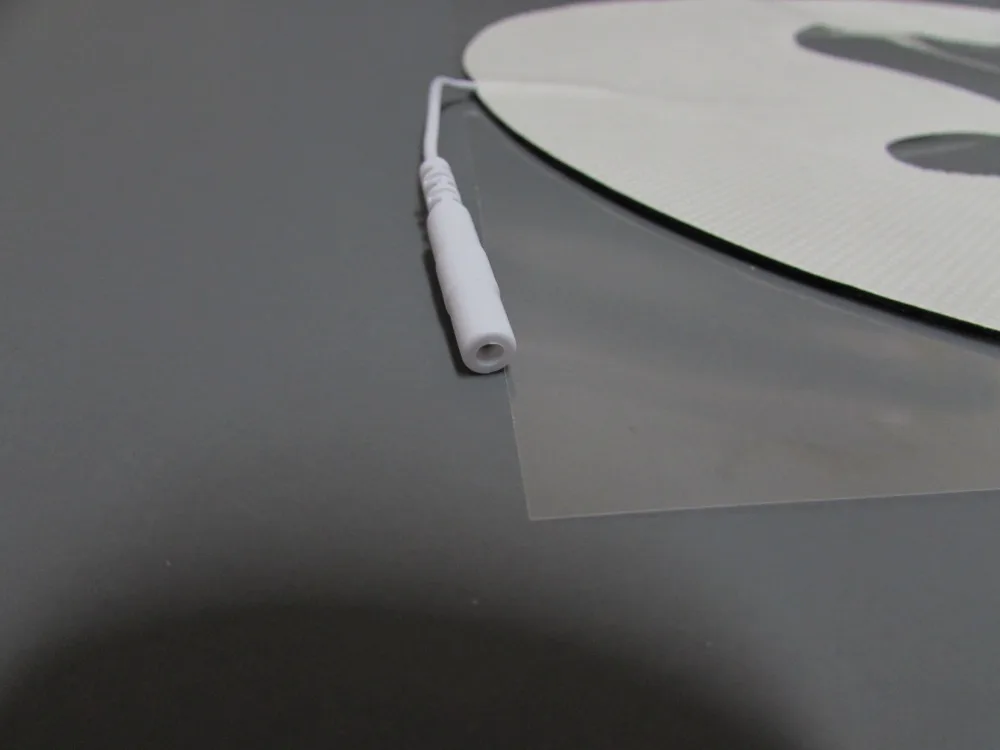 Нетканая электродные подушечки уход за кожей лица Массажные Электроды для