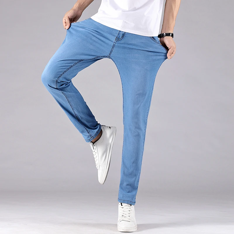 Синие джинсы для мужчин весна лето Стрейчевые тонкие джинсовые брюки высокое