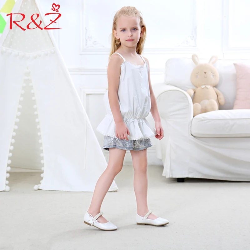 

Комплект одежды R & Z для маленьких девочек, Новинка лета 2019, хлопковая однотонная блузка с лямкой через шею и шорты с блестками, детская одежд...