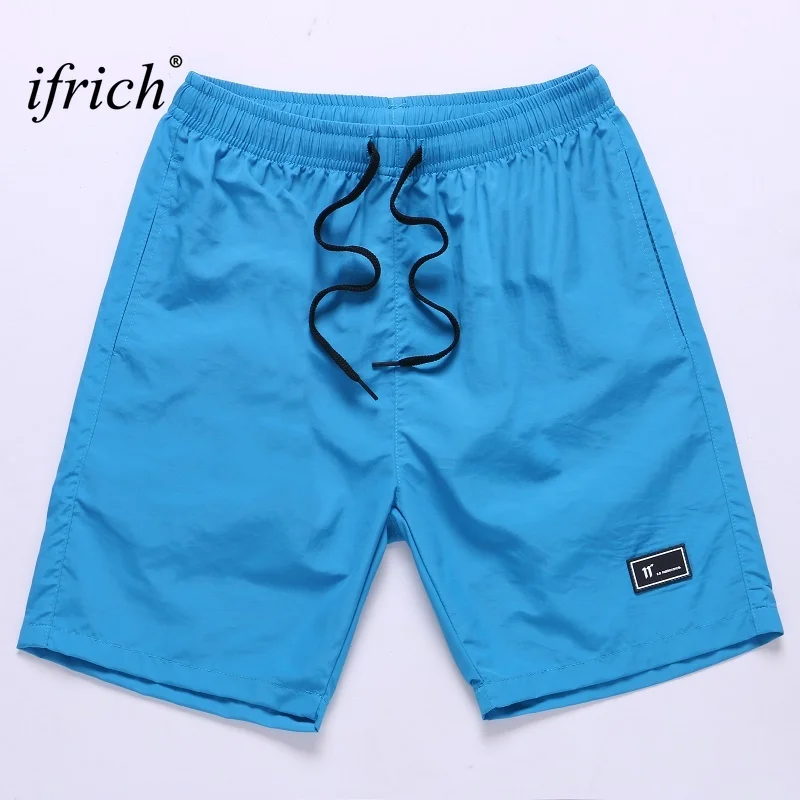 Шорты мужские с карманами модные пляжные короткие штаны однотонные свободные
