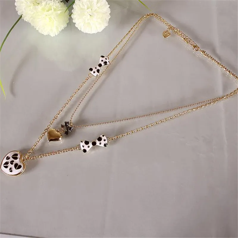 Ожерелье с двойным сердечком XQ черный и белый цвета бесплатной доставкой