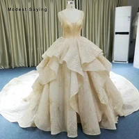 luxury monarch ball gown shiny sparkle beaded wedding dresses 2019 with cathedral train sexy sheer champagne ruffled bridal gown