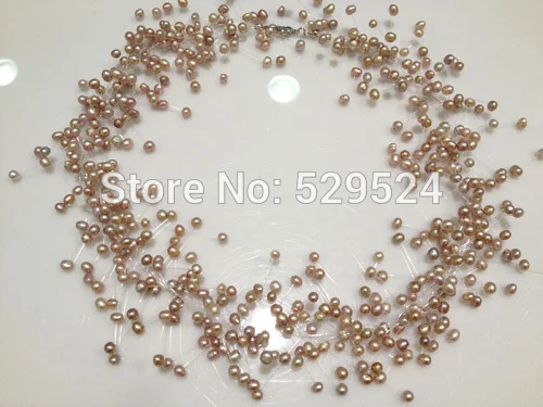 Роскошное стильное украшение с перекрученными слоями, натуральным жемчугом и множеством жемчужин в форме звезды.