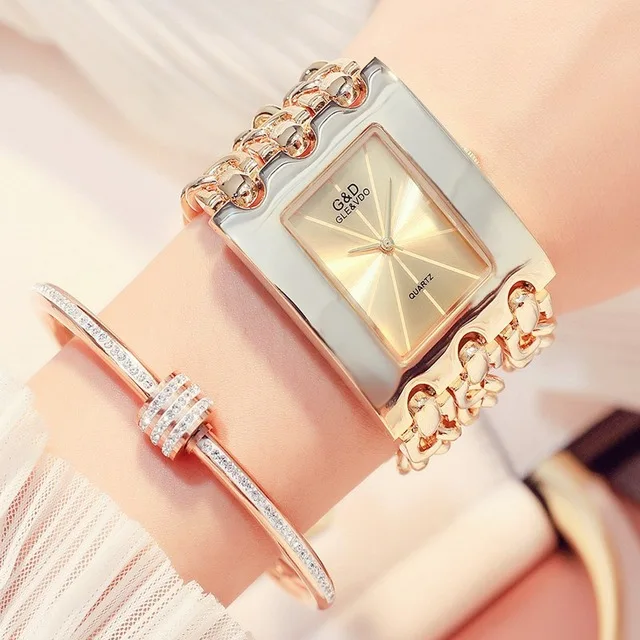 Часы наручные женские кварцевые в стальной полосе золотистые спортивные