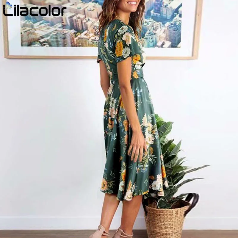 Зеленое женское платье средней длины с цветочным принтом сексуальное v-образным
