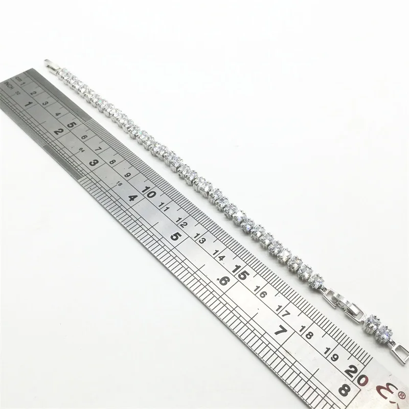 Женский браслет из циркона и камня белого золота 14 карат с прозрачными