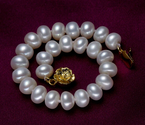 Оригинальные бусины из пресноводного жемчуга имеют скрученные булочки на пару 8-9