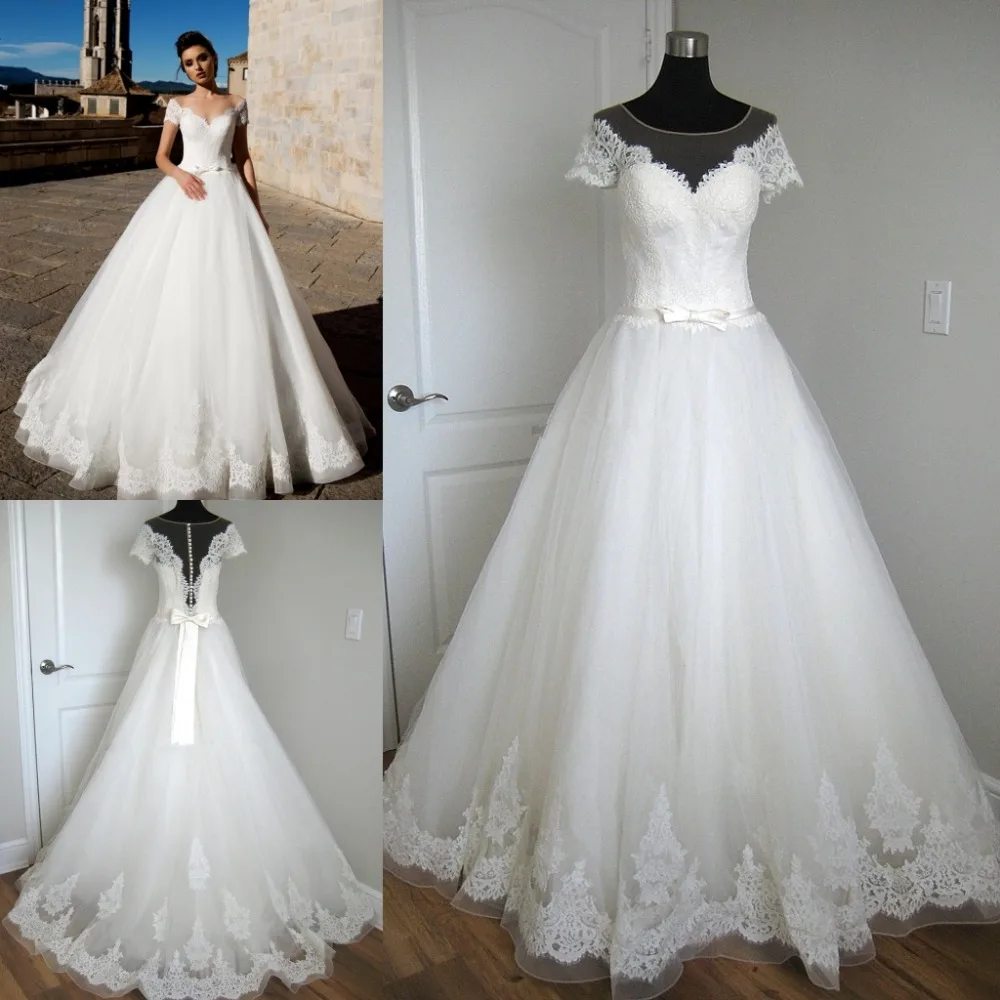 

Ball Gown Designer Wedding Dresses 2019 vestido de noiva Long Train Short Sleeves robe de soiree Illusion O Neck Real Pictures