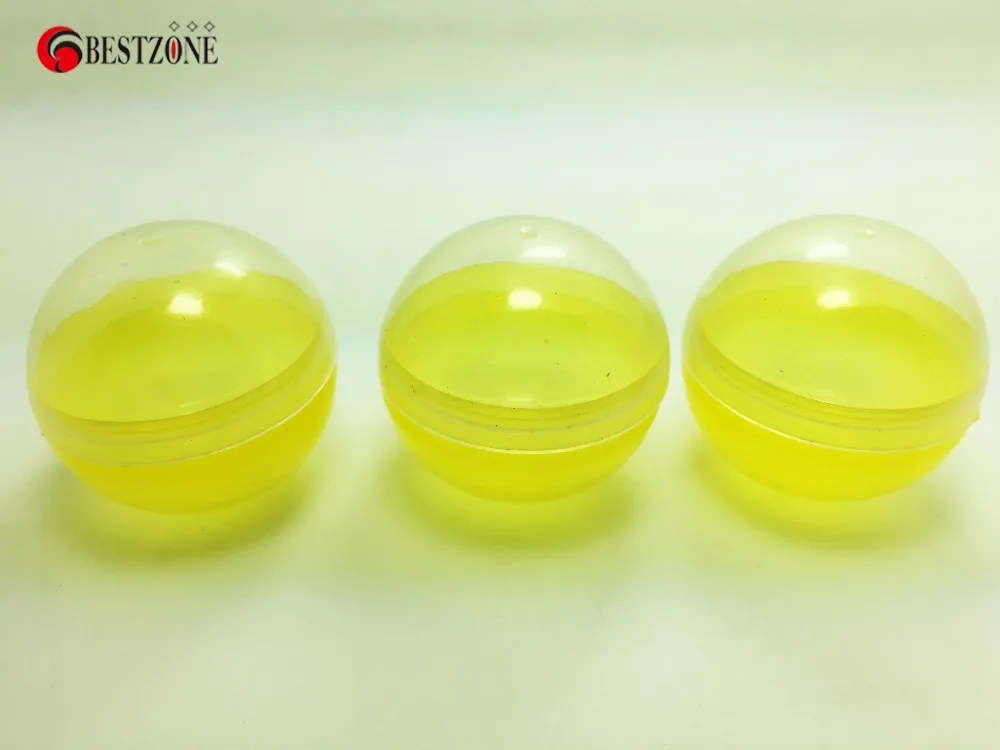

10000pcs/ carton Lucky draw 45mm Plastic balls or Kids Toy Capsules Yellow Transparent Colored can open and close Free Shiping