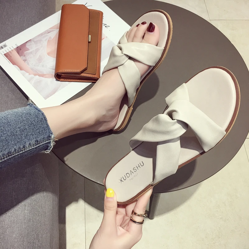 

Women's slippers, summer, new outdoor, flat bottomed cross beach shoes.