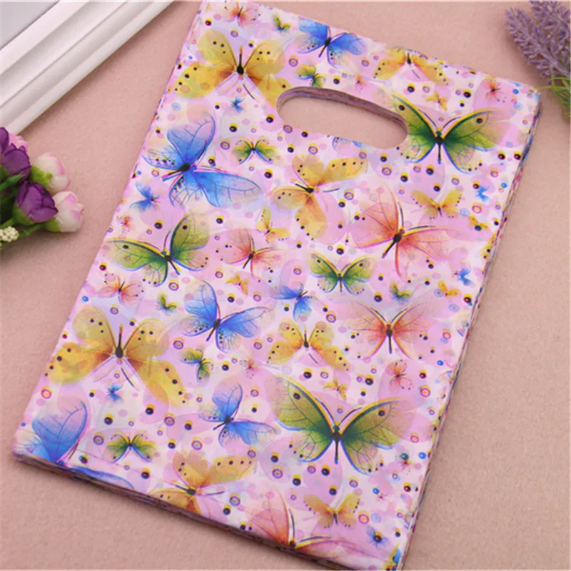 

Wholesale 100pcs/lot 20*30cm Fashion Colorful Butterfly Packaging With Handles Favor Wedding Plastic Birthday Gift Packing Bags
