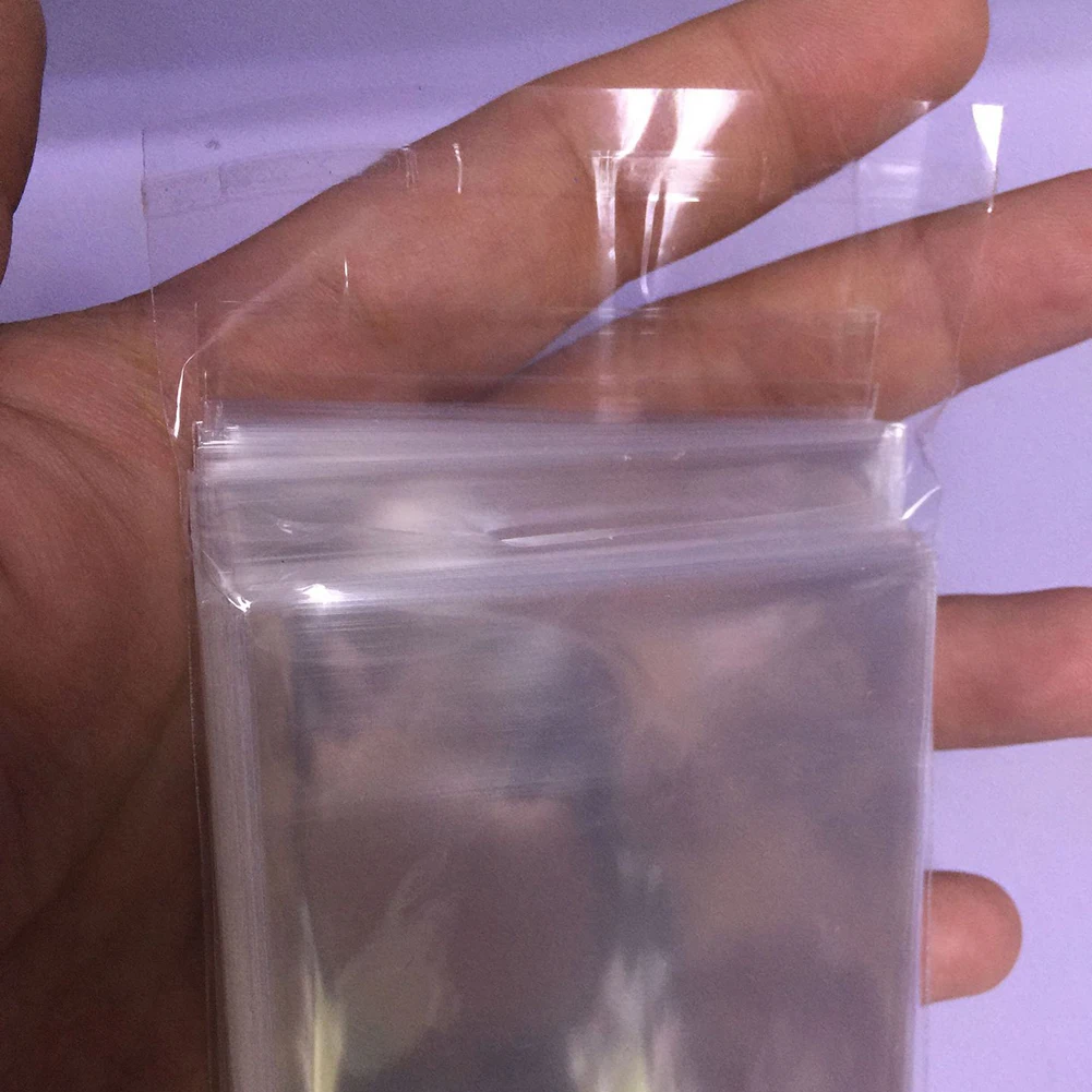100Pcs Clear Game Tarot Three Kingdom Poker Football Star Card Sleeves Protector HOT