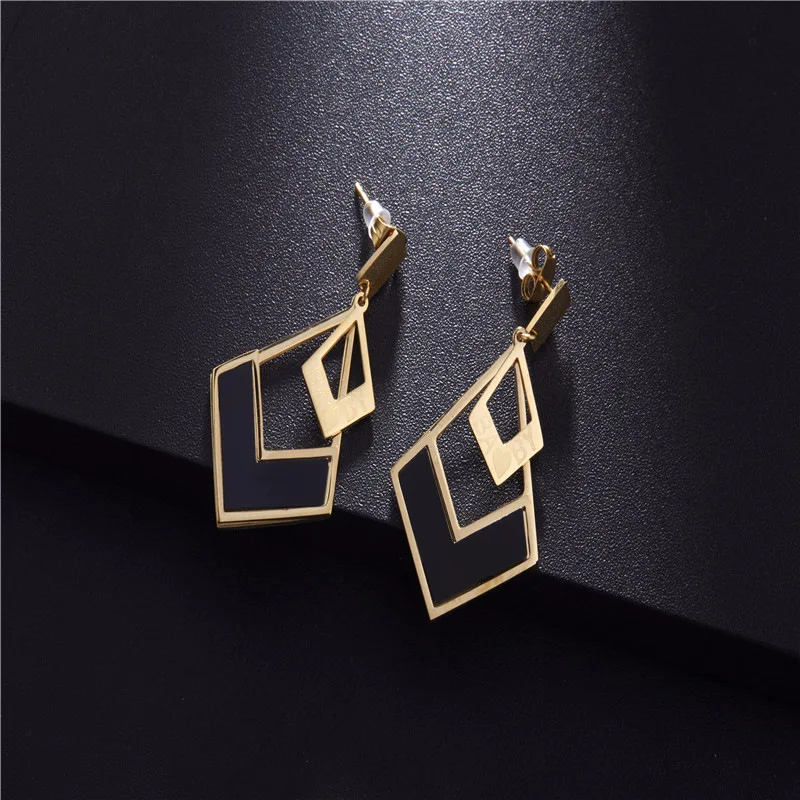 Earrings. Women's jewelry. Geometric type titanium earrings. Triangle Earrings accessories | Stud