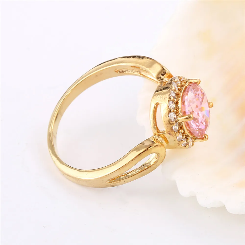 MOLIAM женское кольцо золотистого цвета розовое/красное круглое с фианитом и