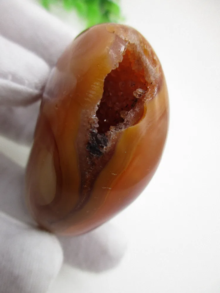 

Natural Stone red agate playing with Hole Chakra Healing Reiki Stone Carving Crafts from Madagascar